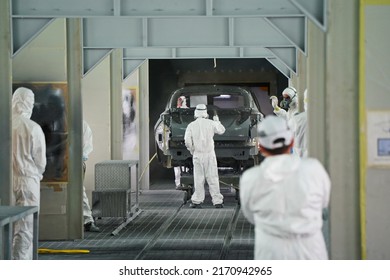 Almaty, Kazakhstan - 03.29.2022 : Workers Paint And Polish The Exterior Of The Car. Hyundai Factory 
