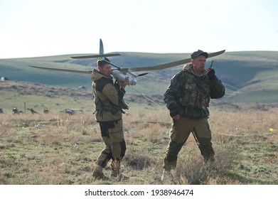 Almaty, Kazakhstan - 04.14.2014 : A Soldier Prepares To Launch An Unmanned Aerial Vehicle. Military Exercises Of The Kazakh Army