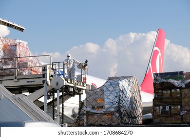 
Almaty / Kazakhstan - 04.18.2020 : Airport Staff And Medics Unload Humanitarian Cargo Turkish Cargo