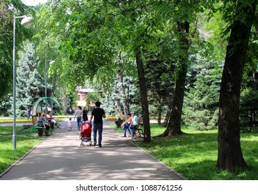Almaty, Kazakhstan - 05.11.2018: Gorky Park. people in the center of Almaty. Early spring time, people walk.
