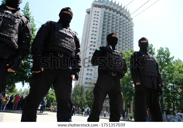 Almaty / Kazakhstan - 06.06.2020 : Police and\
medics are blocking the Central part of the city. Preventing people\
from meeting during\
quarantine.