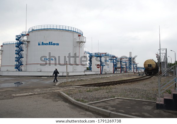 Almaty /\
Kazakhstan - 07.03.2013 : Tanks and cooling towers with fuel.\
Label-company name-Helios. Petrol\
station