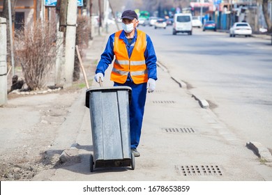 Almaty, Kazakhstan 20/03/2020: Antiviral Masked Street Cleaner During Coronary Virus Outbreak