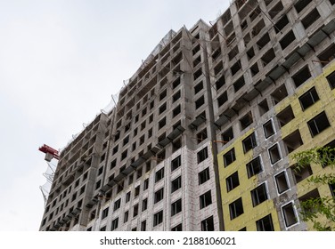 Almaty, Kazakhstan, April 24, 2022: Construction Of A High Apartment Building. View On A Cloudy Day. Copy Space.