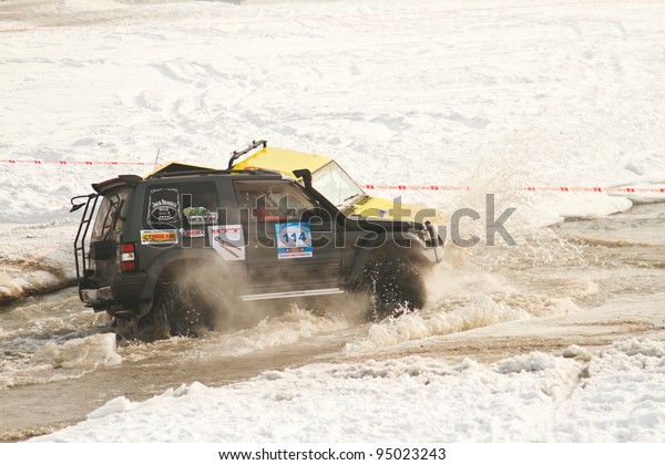 Almaty, Kazakhstan - February 11, 2012.\
Off-road racing jeeps, festival, devoted to 20 Th anniversary of\
independence of Kazakhstan, in honor of first president of\
Federation Avtomotosport\
Kazakhstan.