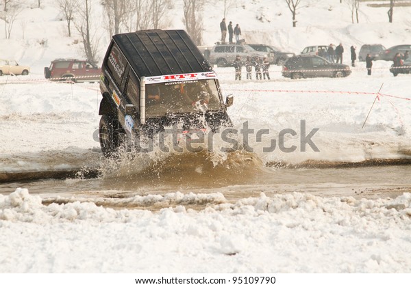 ALMATY, KAZAKHSTAN - FEBRUARY 11: Off-road\
vehicle JEEP (No. 10) 4x4  during festival, devoted to 20 Th\
anniversary of independence of Kazakhstan on FEBRUARY 11, 2012 in\
Almaty, Kazakhstan