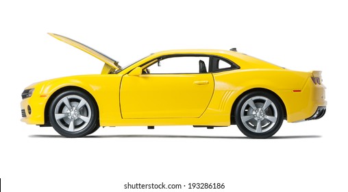 Almaty, Kazakhstan - May 14, 2014: New yellow model Chevrolet Camaro sports isolated on a white background with shadow with open hood
