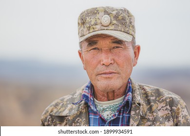 Almaty Province, Kazakhstan - September 23 2017: Portrait Of An Elderly Kazakh Man Park Ranger In Charyn Canyon National Park, Kazakhstan.