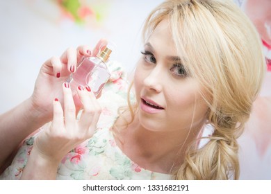 Almaty/Kazakhstan - January 19 2017: Beautiful Caucasian Girl Posing With The Avon Viva La Vita Eau De Parfum. Avon Sales Conference. 