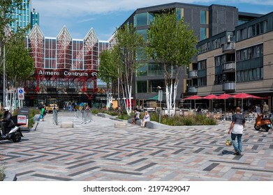 Almere, Flevoland, The Netherlands, 07 20 2022 - Contemporary Square With The Town Hall And Railway Station During Summer Holidays