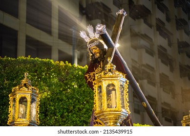 Almeria, Spain, 03-29-2018. Easter, Holy Week In Spain, Brotherhoods Take Religious Images In Procession Through Streets Of All Cities. Detail. Pre-Covid.