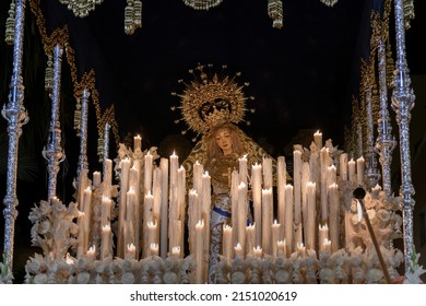 Almeria, Spain, 04-10-2022. Penitents take their religious images to streets, it is Spanish Holy Week. This image it is of Maria Santisima of star. Brotherhood of Star.