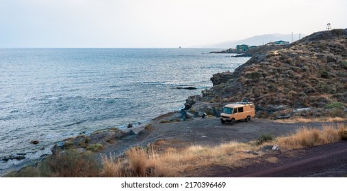 Almeria, Spain 06 21 22.
Camper Van  Parked On The Beach At Sunset. Van Life 