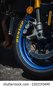 Almeria, Spain - May 4th 2021: Close up view of Dunlop motorbike tyre and brake disc on Yamaha motorbike during Dunlop Xperience showroom and test in Almeria, Spain.