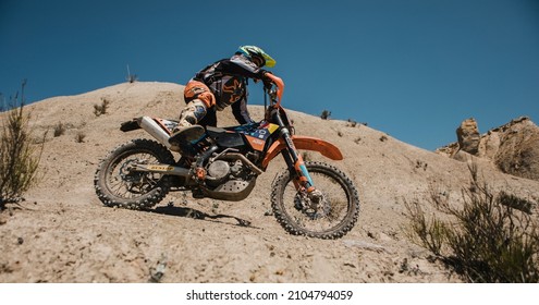 Almeria, Spain - May 5th 2021: Motocross Rider Riding Downhill In Tabernas Desert During Dunlop Xperience Showroom And Test In Almeria, Spain.