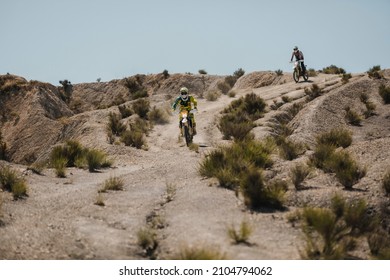 Almeria, Spain - May 5th 2021: Motocross Riders Riding Downhill In Tabernas Desert During Dunlop Xperience Showroom And Test In Almeria, Spain.