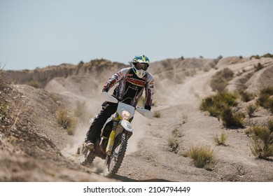 Almeria, Spain - May 5th 2021: Motocross Riders Riding Downhill In Tabernas Desert During Dunlop Xperience Showroom And Test In Almeria, Spain.