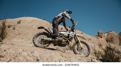 Almeria, Spain - May 5th 2021: Motocross Rider Riding Downhill In Tabernas Desert During Dunlop Xperience Showroom And Test In Almeria, Spain.