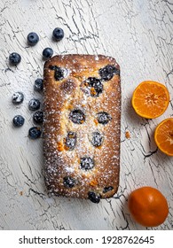 Almond Blueberry Lemon Mandarin Gluten Free Pound Cake On White Background Top View 
