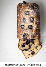 Almond Blueberry Lemon Mandarin Gluten Free Pound Cake On White Background Top View 
