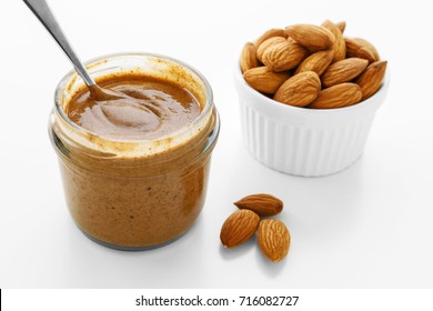 Almond Butter With Almonds On White Background