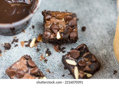 Almond Butter Brownies Dates Topping With Almonds And Chocolate Chips. Selective Focus