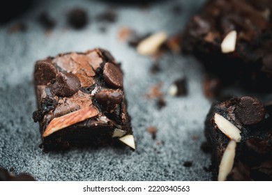 Almond Butter Brownies Dates Topping With Almonds And Chocolate Chips. Selective Focus