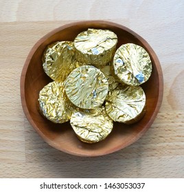 Almond Butter Cups In A Wooden Bowl.