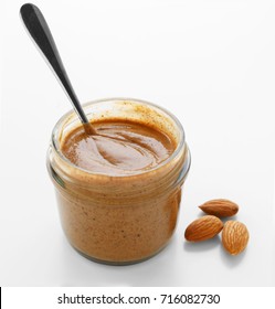 Almond Butter In Jar On White Background