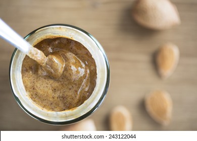 Almond Butter In Jar With Spoon, From Directly Above