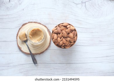 Almond Butter Spread And Nuts On Table, Top View 