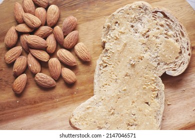 Almond Butter Spread On A Brown Bread On Table 