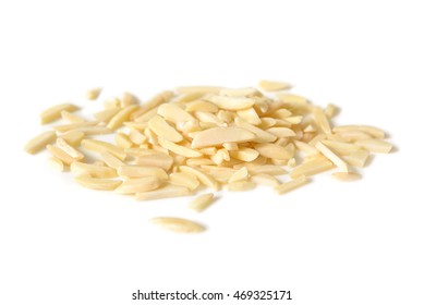 Almond chopped on white background - isolated - Shutterstock ID 469325171