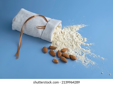 Almond Flour, Bag Of Nut Flour On Blue Background