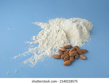 Almond Flour, Bag Of Nut Flour On Blue Background