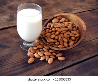 Almond Milk In Glass With Almonds