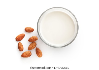 Almond Milk In Glass And Almond Nuts Isolated On White Background. Top View.