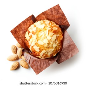 Almond Muffin In Brown Paper Isolated On White Background, Top View