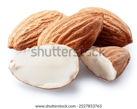 Almond nuts and split almonds isolated on white background. File contains clipping path.