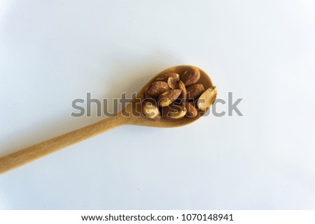 Similar – Image, Stock Photo Wooden background with almonds and chia seeds