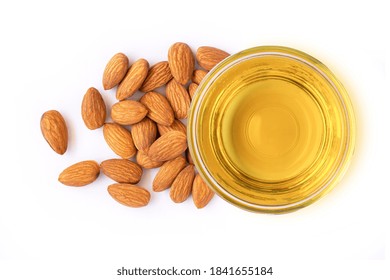 Almond Oil And Almonds Nuts Isolated On White Background. Top View. Flat Lay.