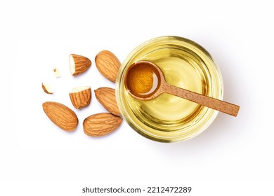 Almond Oil And Almonds Nuts Isolated On White Background. Top View. Flat Lay.