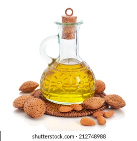 Almond oil in bottle isolated on white background