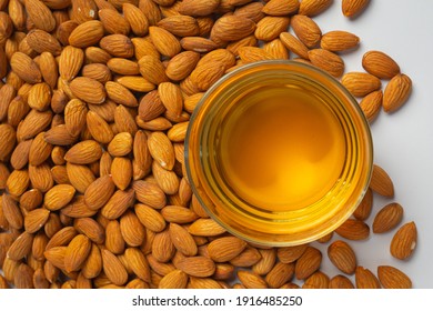 Almond Oil In Bottle On White Background