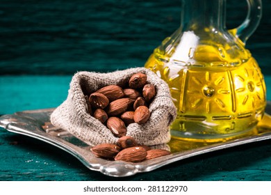 almond oil on wooden table