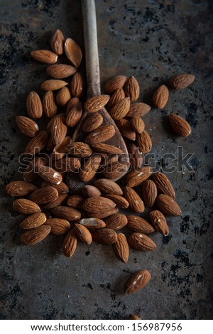 Similar – Image, Stock Photo Wooden background with almonds and chia seeds