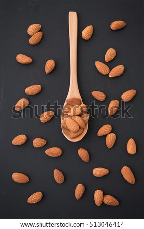 Similar – Image, Stock Photo Wooden background with almonds and chia seeds