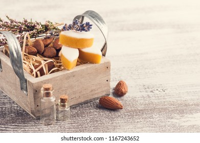 Almonds and calissons in box, rustic decor, lavender flowers on wooden table