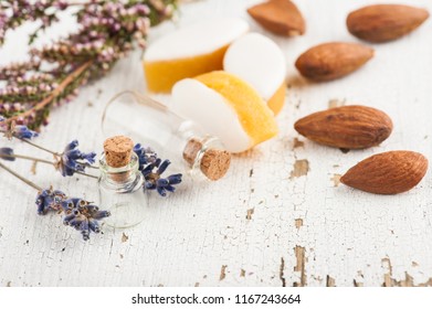 Almonds and calissons with rustic decor, lavender flowers on wooden table