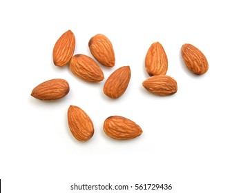 Almonds isolated on white background - Shutterstock ID 561729436